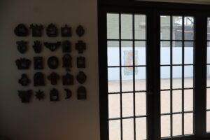 Previous participants and volunteers with courtyard view.